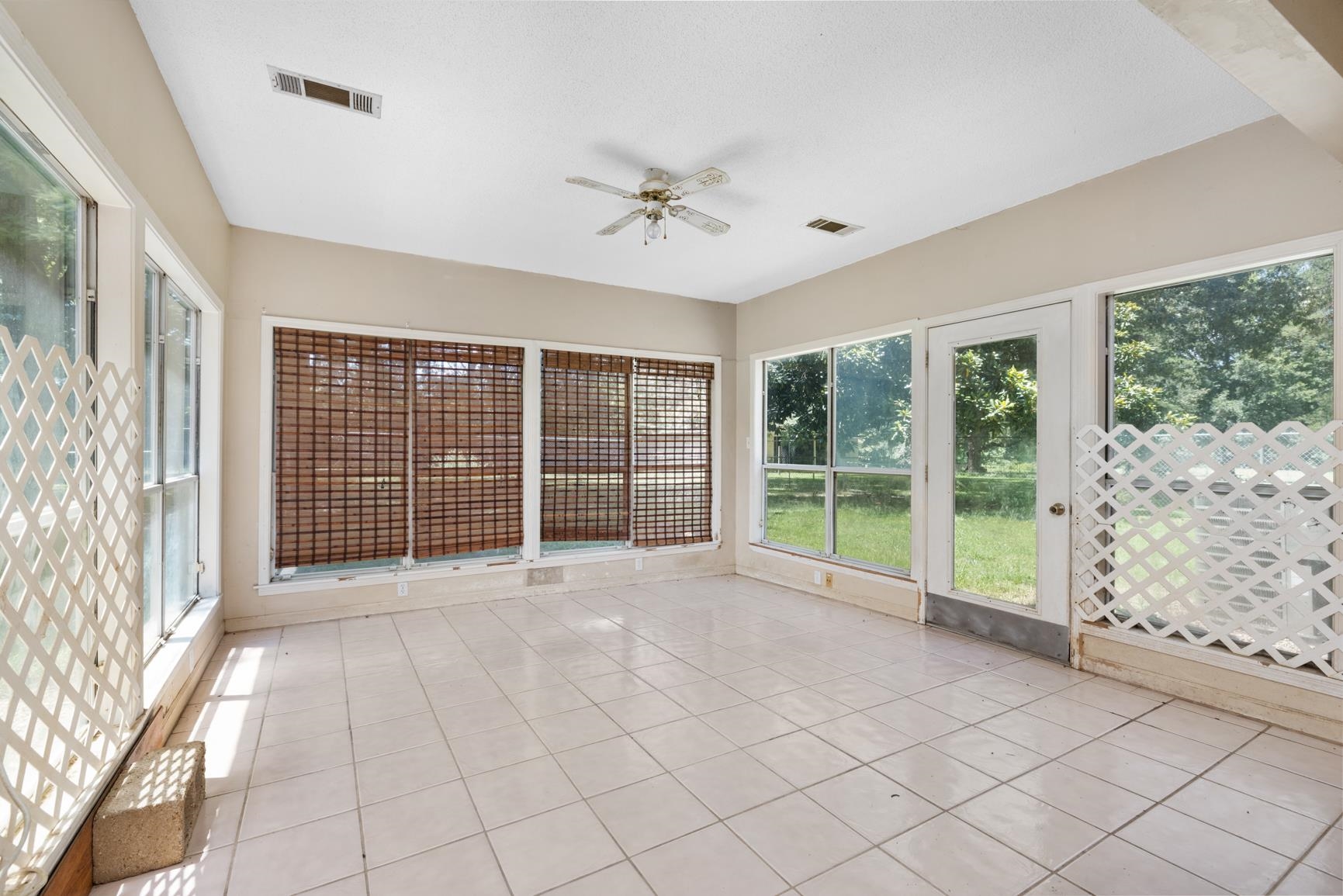 5015 Eagles Nest Lane Bartlett, TN 38002 - Photo 36 of 39 Unfurnished sunroom with ceiling fan and tile patterned floors