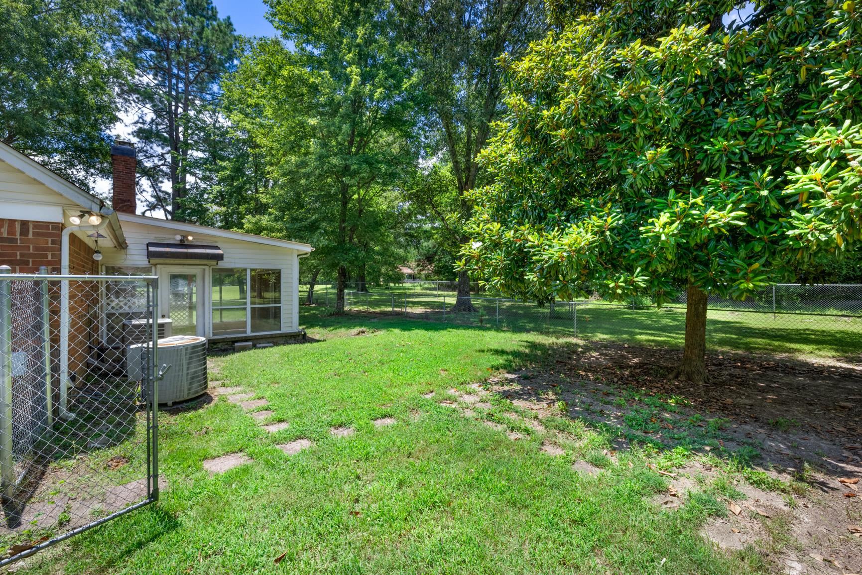 5015 Eagles Nest Lane Bartlett, TN 38002 - Photo 38 of 39 Fenced backyard with a sunroom