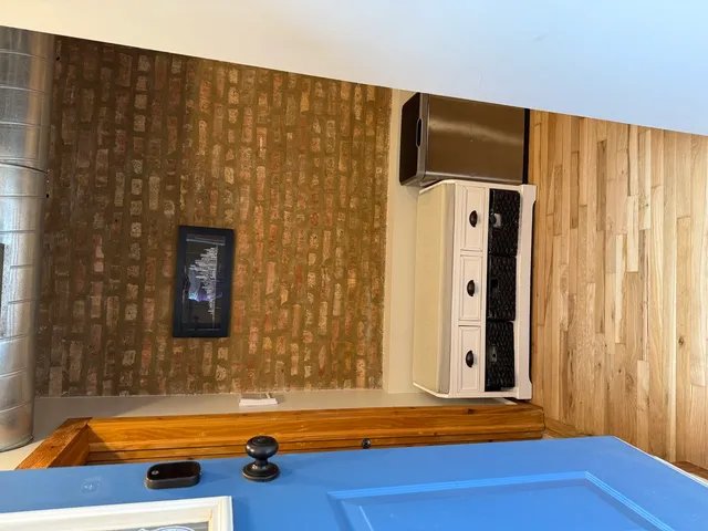 a bathroom with a tub and a sink