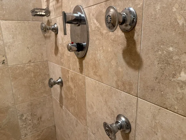 a close view of a shower and in it
