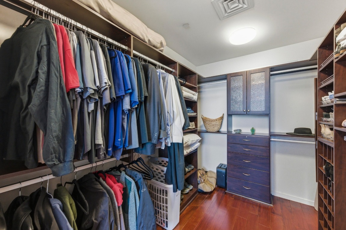 200 Congress Avenue, Unit 14A Austin, TX 78701 - Photo 24 of 40 a view of walk in closet with clothes
