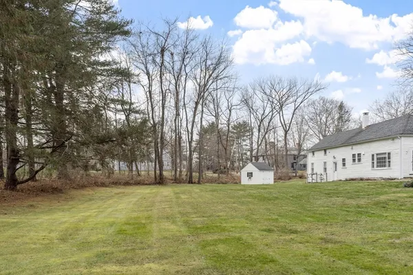 a view of a yard in front of a house