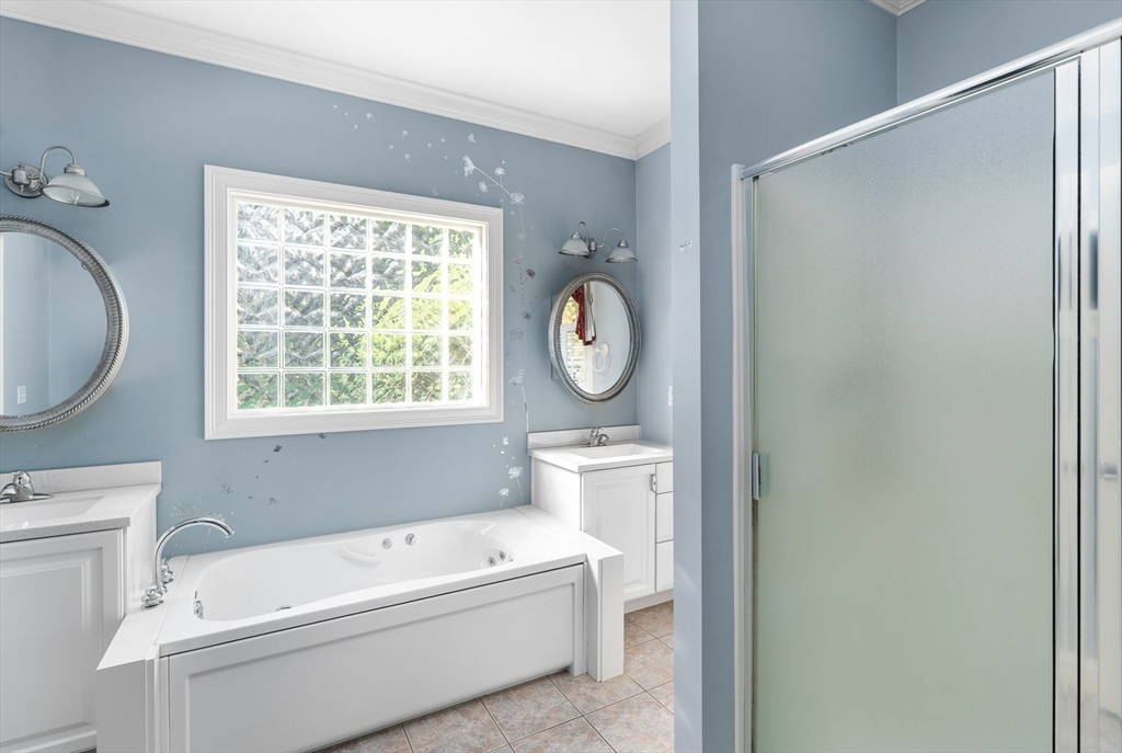 10 Golden Circle Southampton, MA 01073 - Photo 16 of 33 a bathroom with a toilet a sink and a mirror