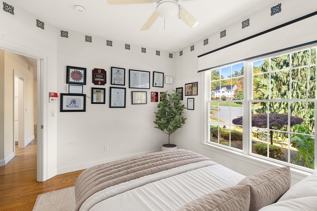 10 Golden Circle Southampton, MA 01073 - Photo 18 of 33 a bedroom with a large bed and a window