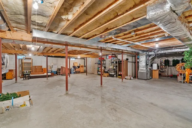a view of a house with a yard porch and sitting area