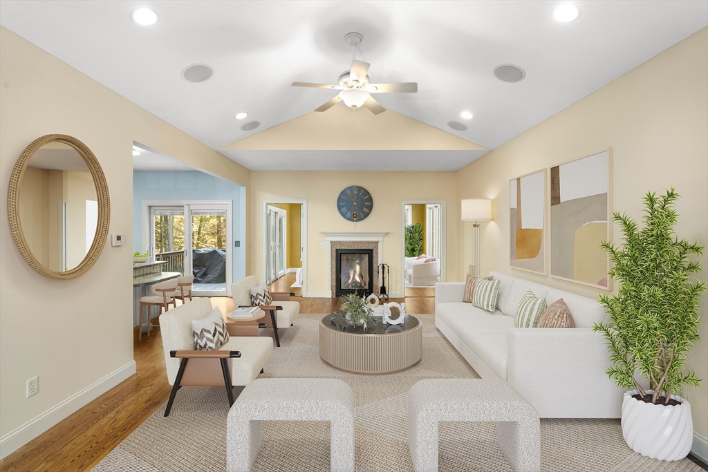 10 Golden Circle Southampton, MA 01073 - Photo 6 of 33 a living room with furniture a chandelier and a large mirror