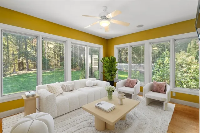 a kitchen with stainless steel appliances granite countertop a stove a sink and white cabinets