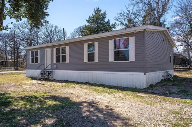 a view of a backyard with a garden