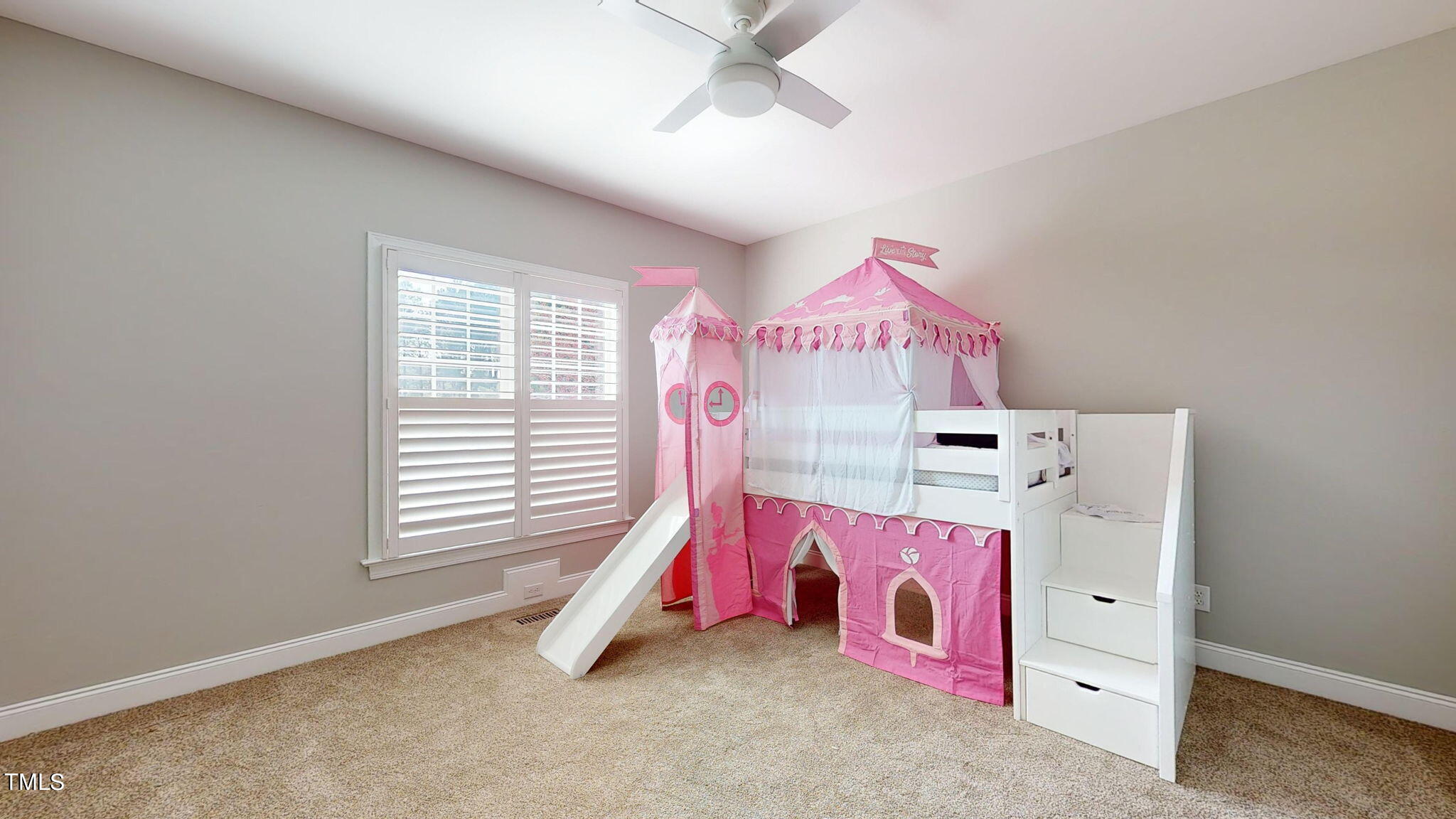 5813 Turner Store Lane Raleigh, NC 27603 - Photo 17 of 35 a bed room with a bed and a window