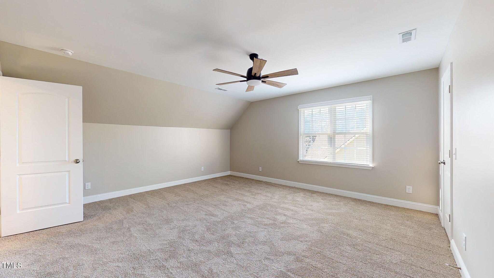 5813 Turner Store Lane Raleigh, NC 27603 - Photo 21 of 35 an empty room with windows and fan