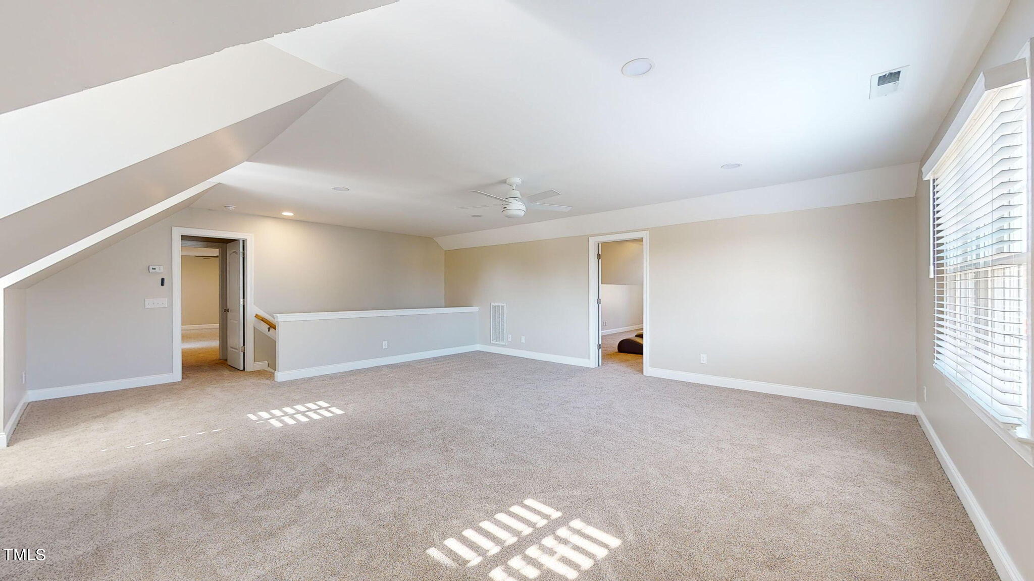 5813 Turner Store Lane Raleigh, NC 27603 - Photo 26 of 35 an empty room with windows