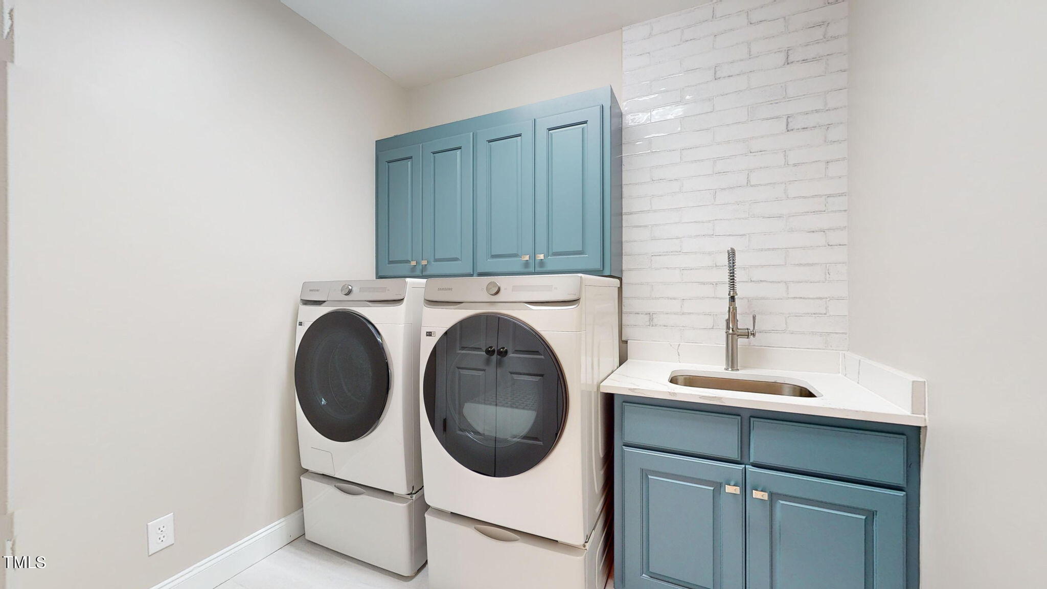 5813 Turner Store Lane Raleigh, NC 27603 - Photo 30 of 35 a utility room with dryer and washer