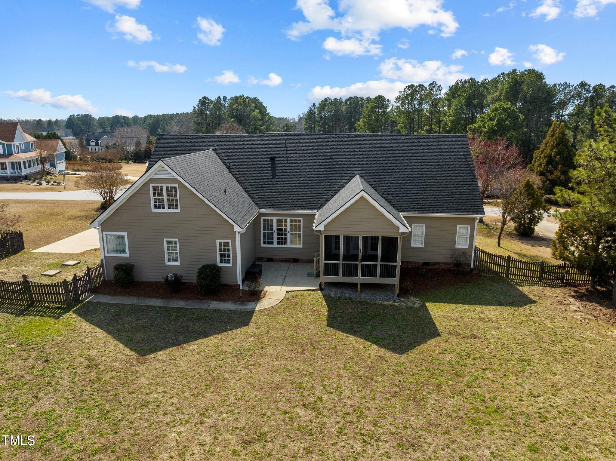 5813 Turner Store Lane Raleigh, NC 27603 - Photo 33 of 35 a view of a house with a yard