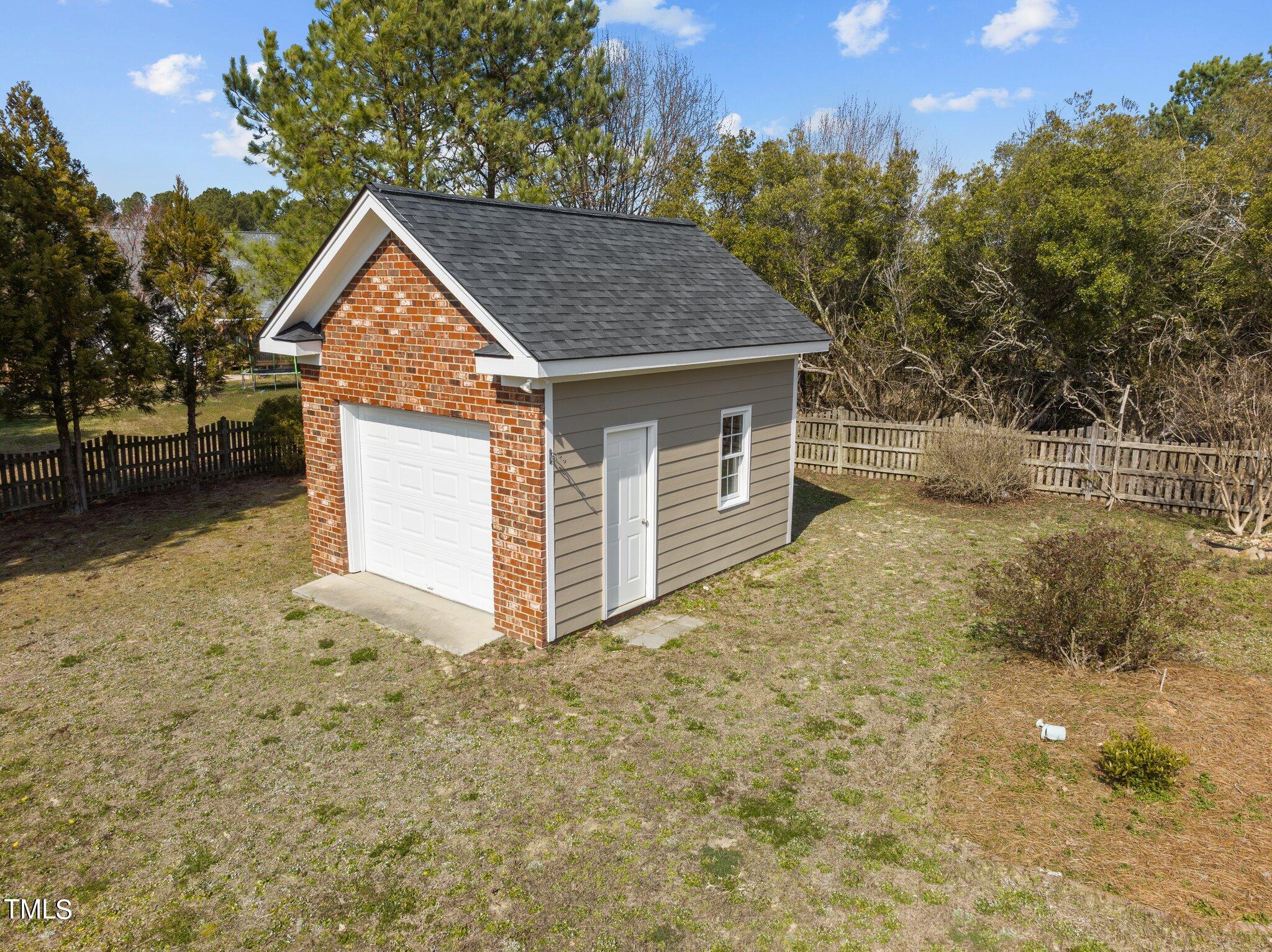 5813 Turner Store Lane Raleigh, NC 27603 - Photo 34 of 35 a view of a house with a yard