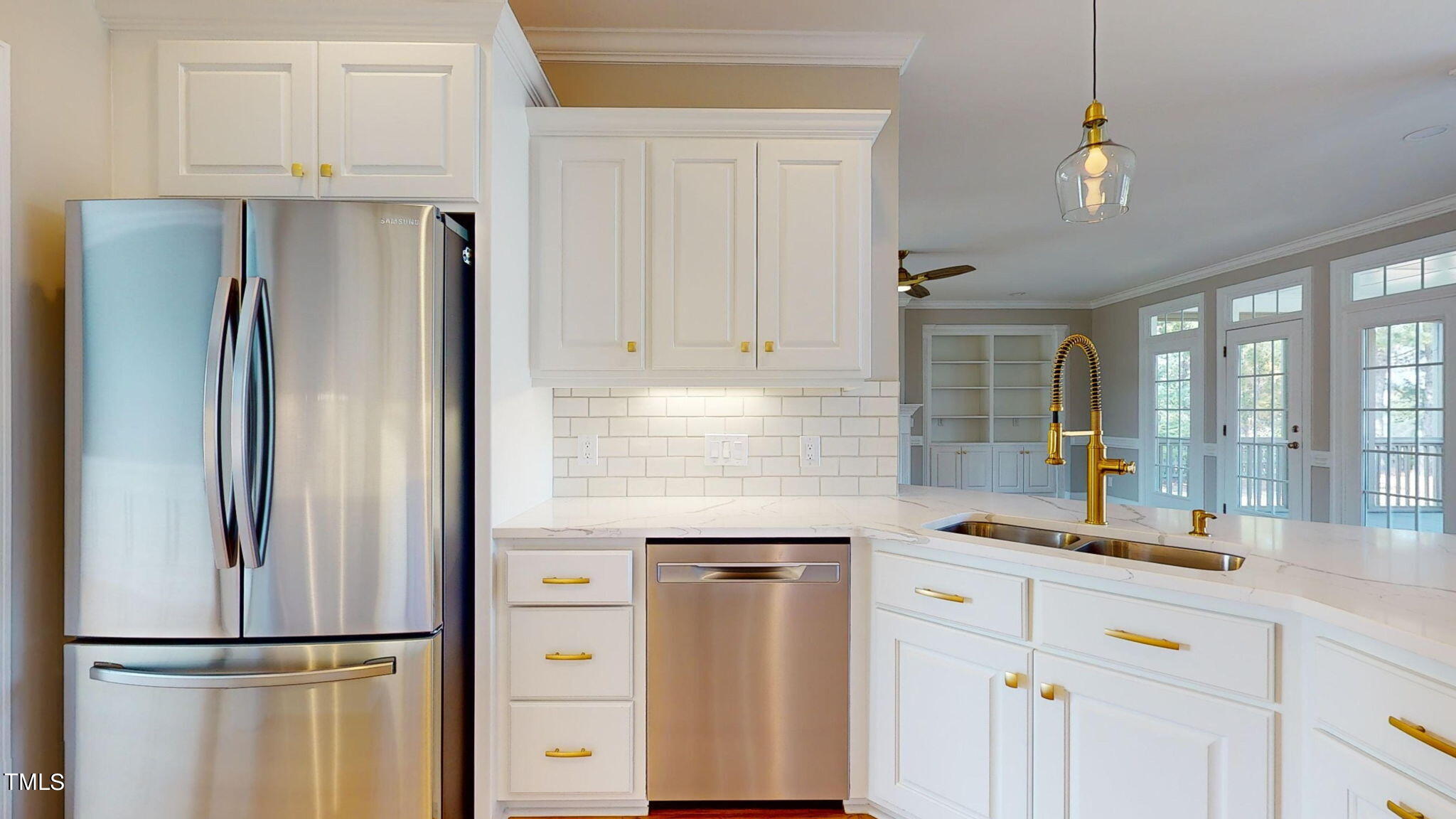 5813 Turner Store Lane Raleigh, NC 27603 - Photo 8 of 35 a kitchen with stainless steel appliances granite countertop a refrigerator and a sink