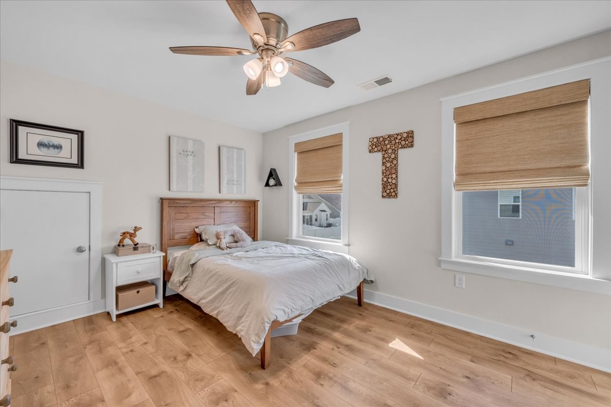 5116 Bridgemore Boulevard Murfreesboro, TN 37129 - Photo 20 of 38 a bedroom with a bed chandelier and a window