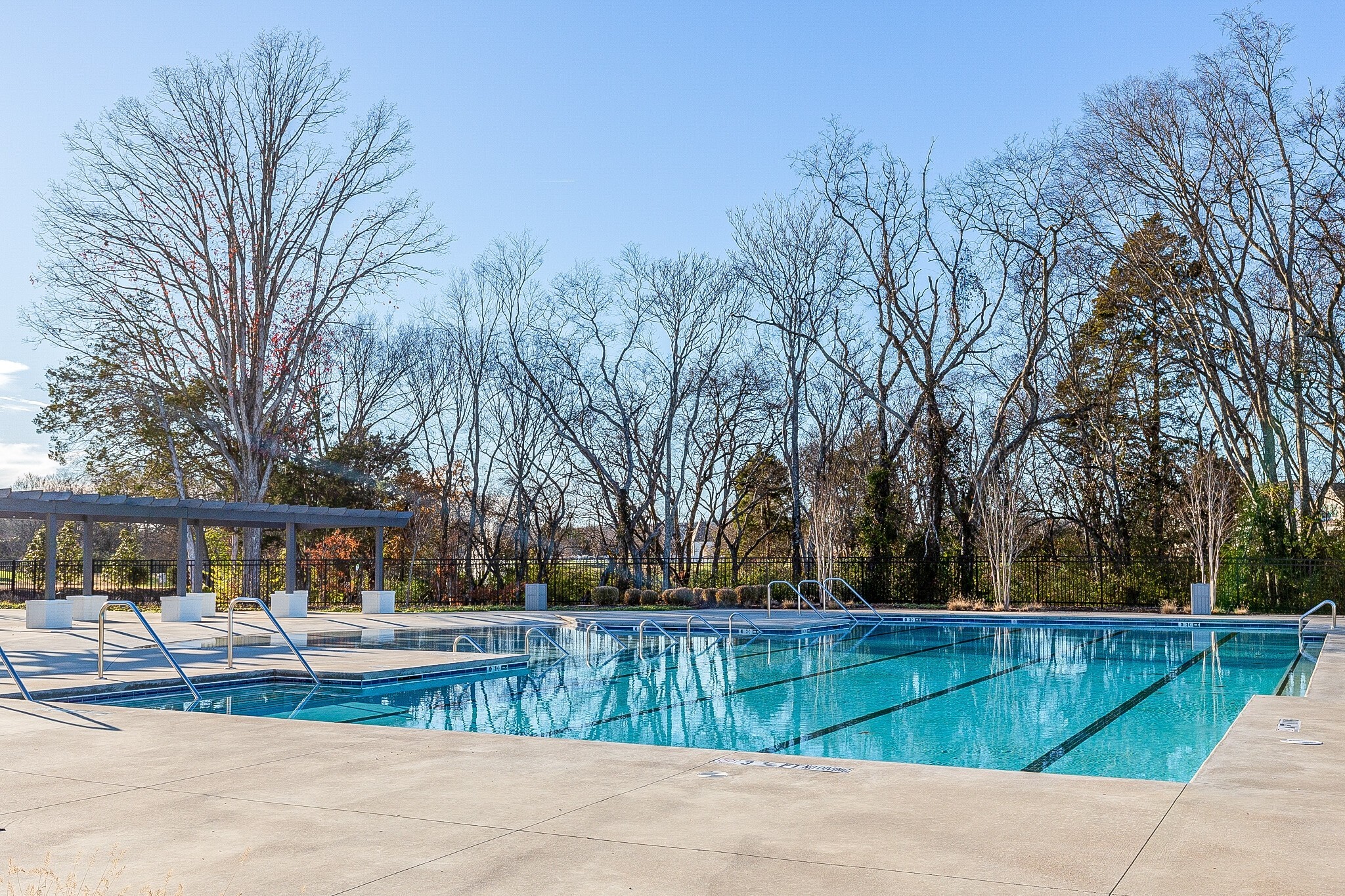 5116 Bridgemore Boulevard Murfreesboro, TN 37129 - Photo 38 of 38 a view of backyard with large trees and a wooden fence