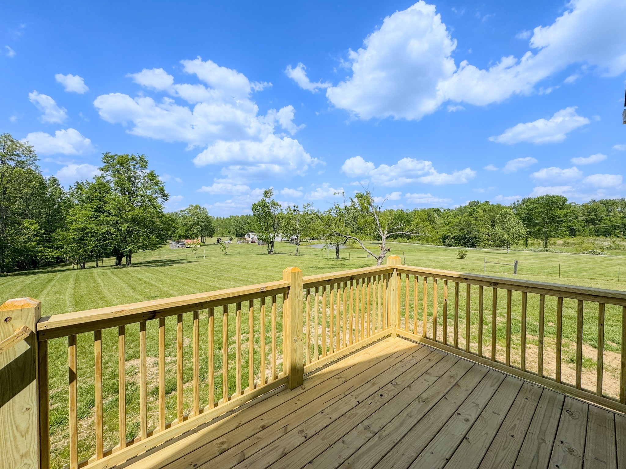 181 Rock House Hollow Road Bethpage, TN 37022 - Photo 37 of 51 a view of balcony with wooden floor and fence