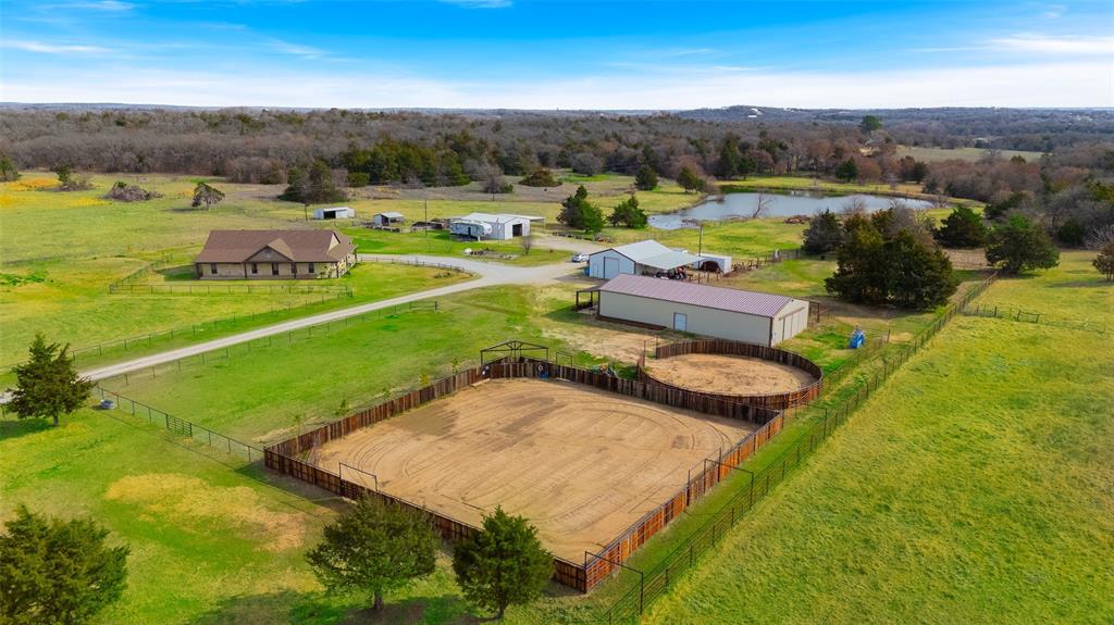 289 Blackjack Road Valley View, TX 76272 - Photo 9 of 40 60' round pend and 100' x 100' Arena with viewing deck (room to extend length and width.