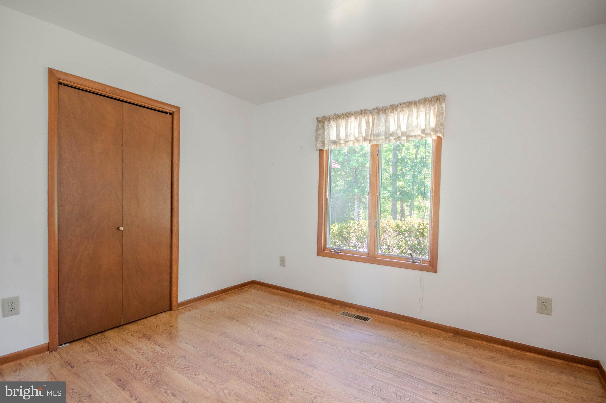 31749 Morris Leonard Road Parsonsburg, MD 21849 - Photo 16 of 40 Bright and airy room with nature views.