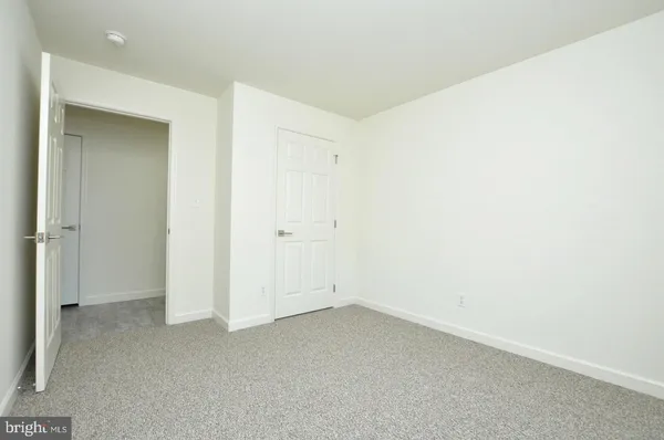 an empty room with an entryway
