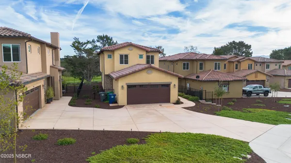 aerial view of a house with a swimming pool