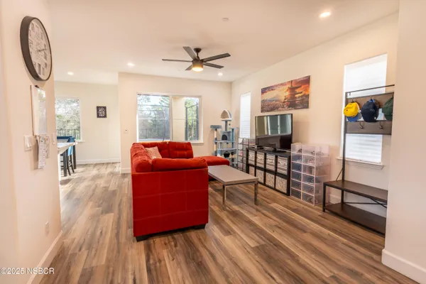 a view of a dining room with furniture window and outside view