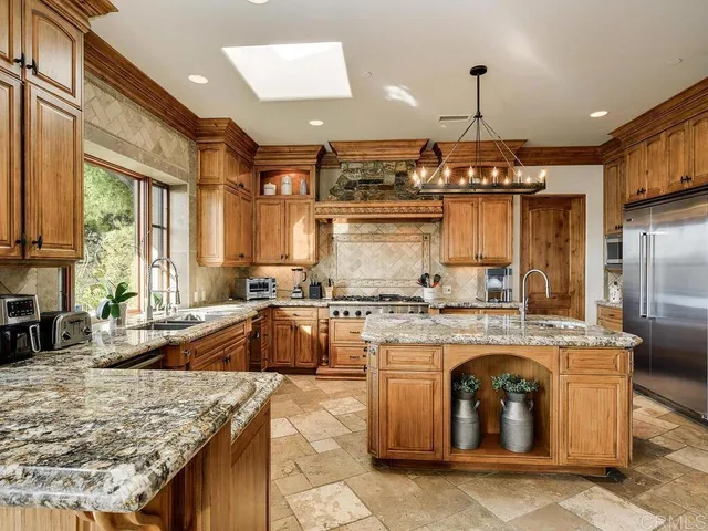 a view of kitchen with furniture and window