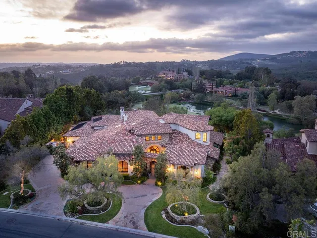 an aerial view of an house with outdoor space