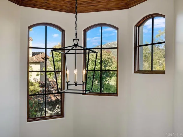 a view of a swimming pool with a lake from a balcony