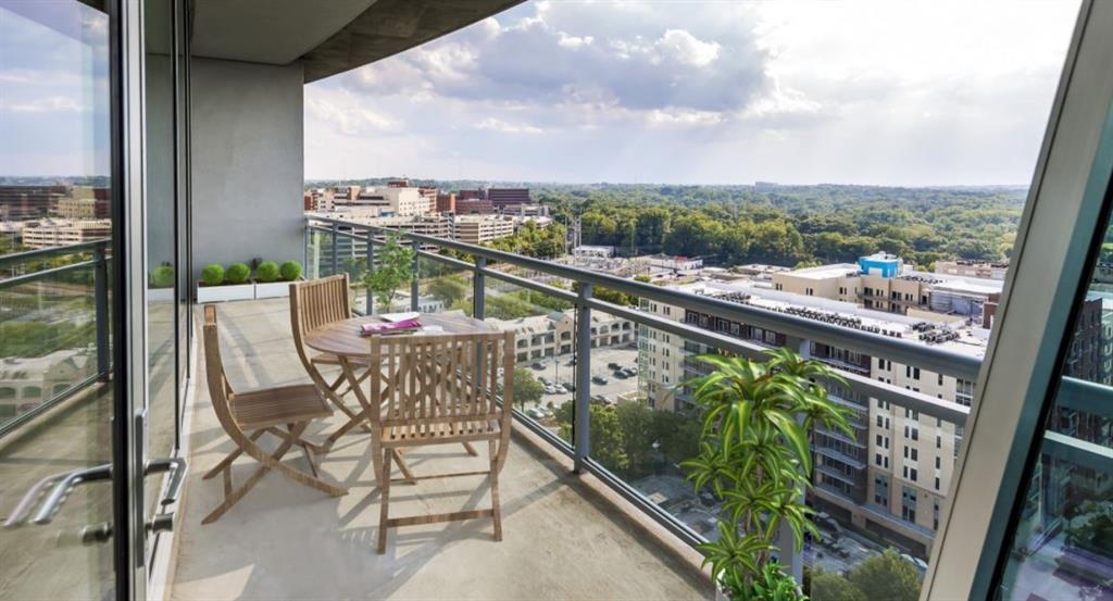 2171 Peachtree Road, Unit 1403 Atlanta, GA 30309 - Photo 10 of 25 a view of a chairs and table in the balcony
