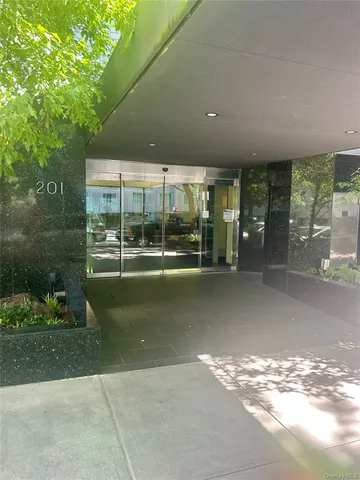 a view of a building with a garden