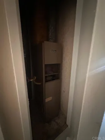 a view of storage and utility room