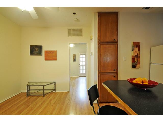 4401 Speedway, Unit 302 Austin, TX 78751 - Photo 13 of 25 Bar and Breakfast Area. View to bedroom and Private Balcony.