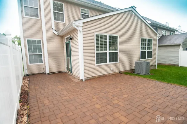 a view of backyard with green space