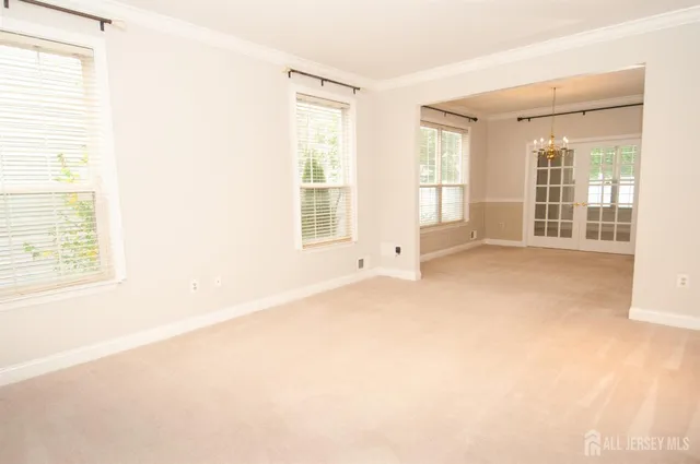 a bathroom with a granite countertop toilet and a sink
