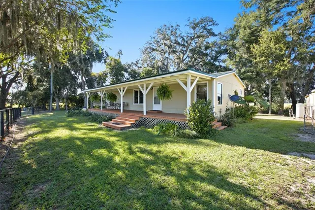 a kitchen with a sink cabinets and window