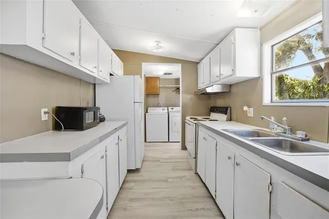 a view of a chairs and table in a patio