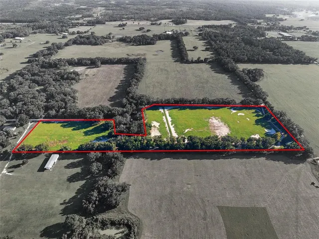 a view of a swimming pool with an outdoor seating