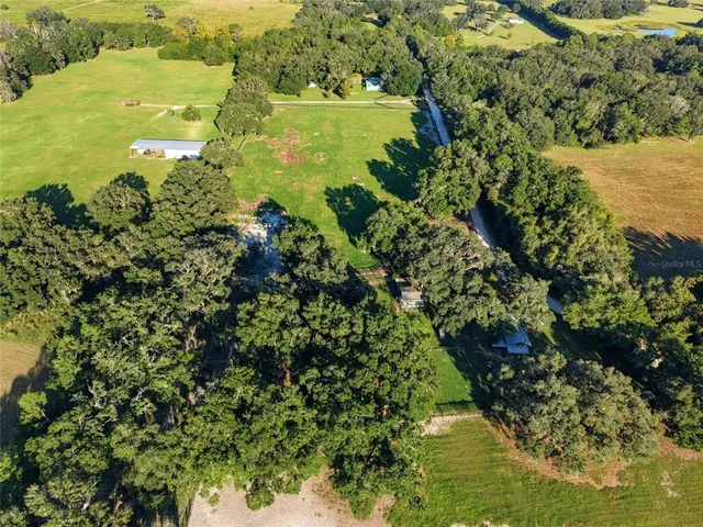 a view of a swimming pool and an outdoor space