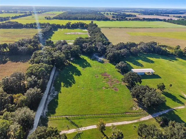 a view of a golf course with a yard