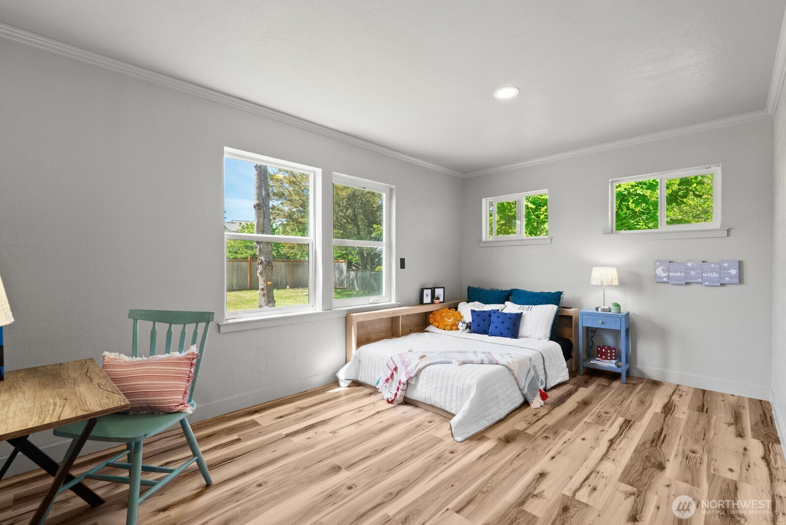 307 4th Street Steilacoom, WA 98388 - Photo 21 of 39 a bedroom with two beds and a large window