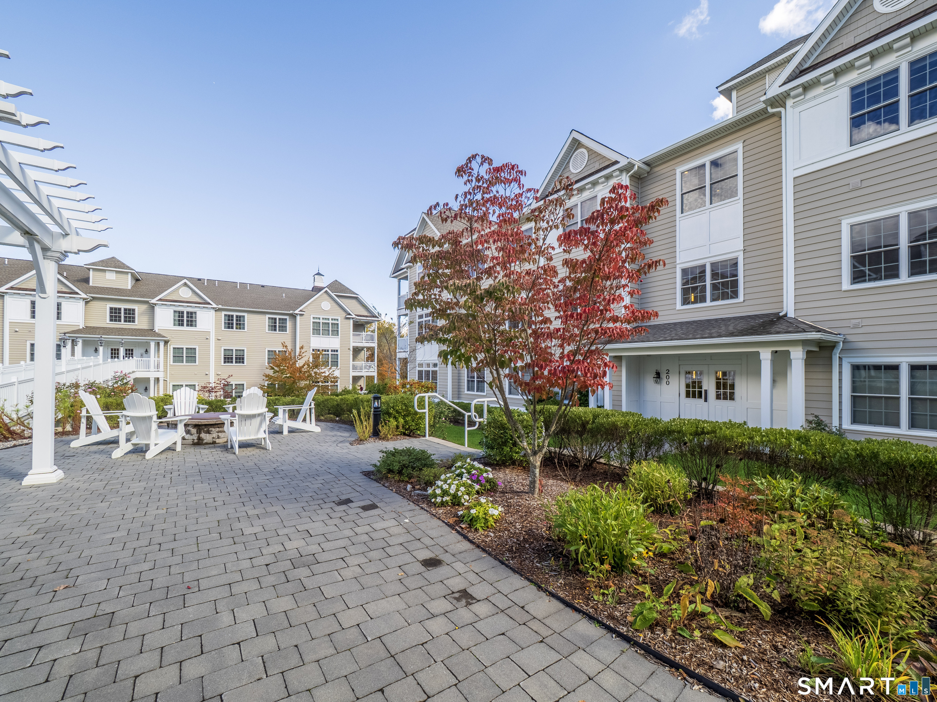 a view of a building with sitting area