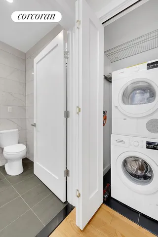 a utility room with dryer and washer
