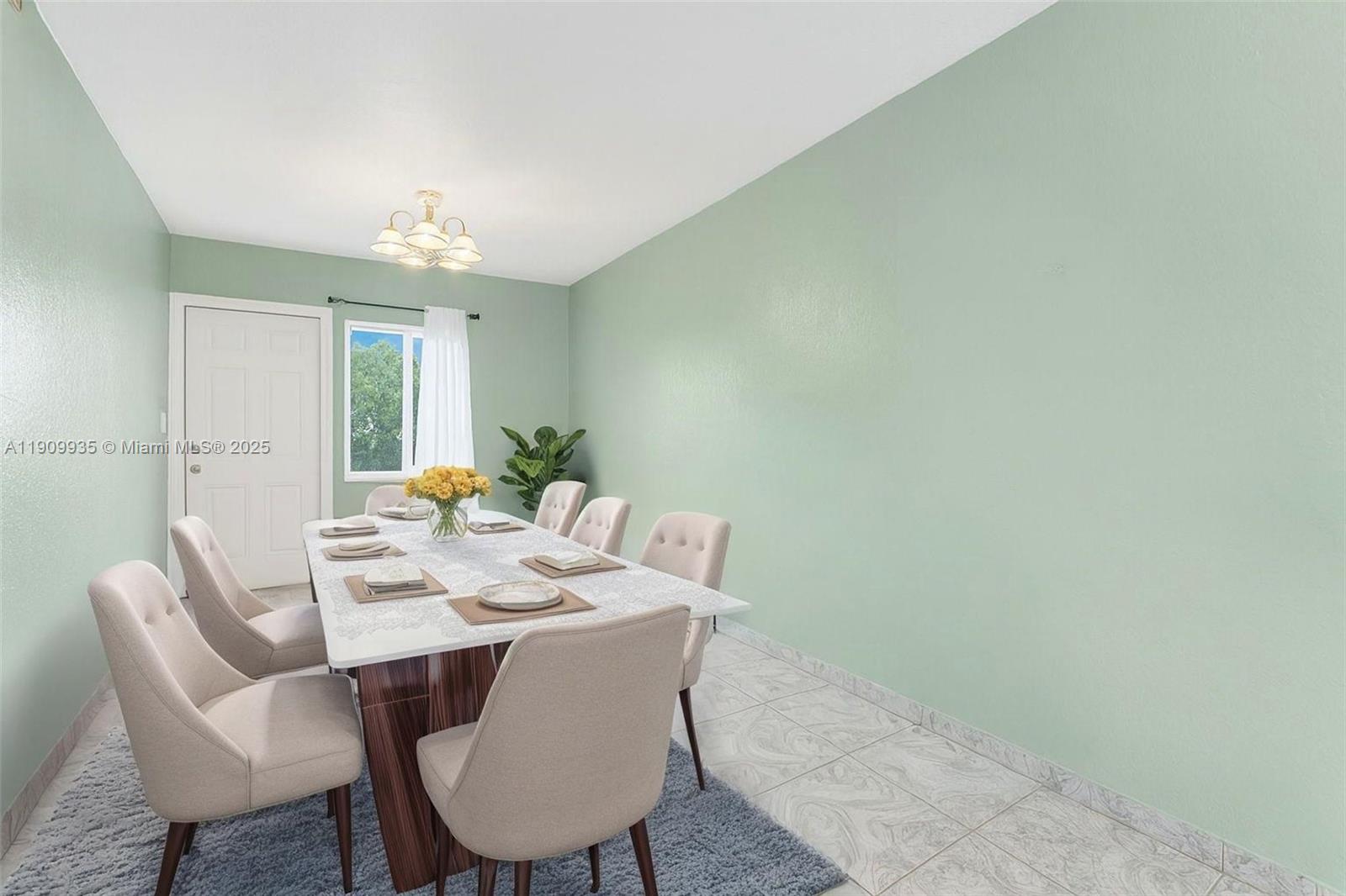 427 Northwest 84th Terrace, Unit 427 Miami, FL 33150 - Photo 15 of 40 a view of a dining room with furniture
