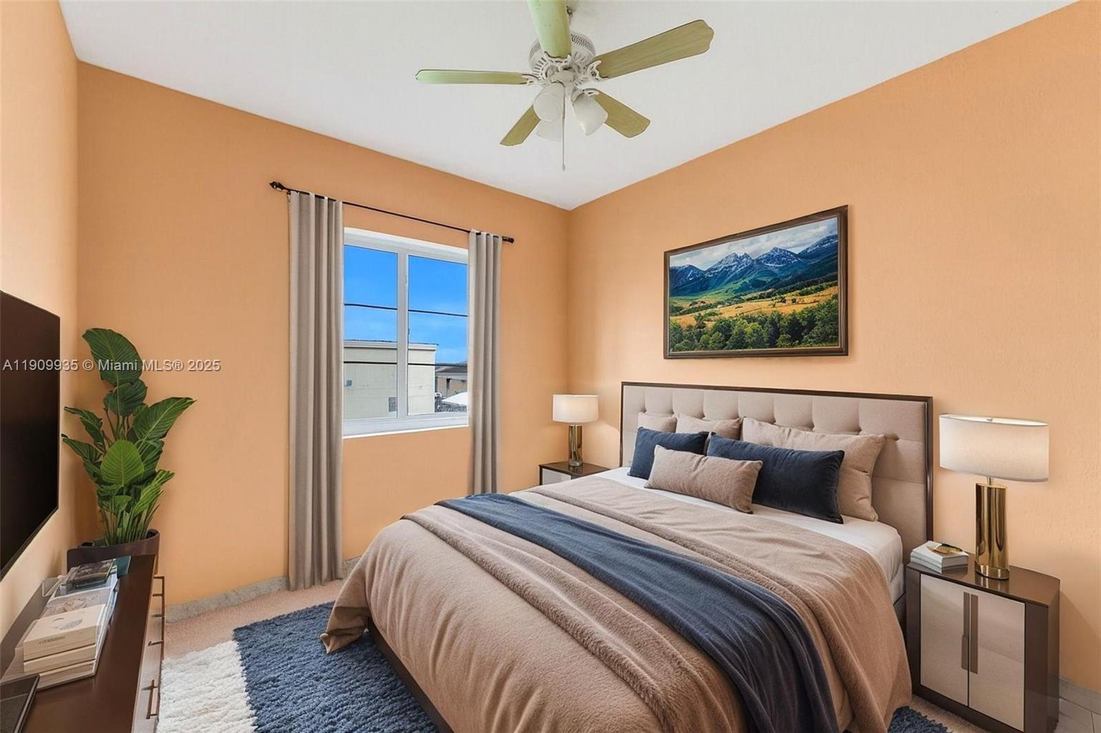 427 Northwest 84th Terrace, Unit 427 Miami, FL 33150 - Photo 27 of 40 a bedroom with bed and wooden floor