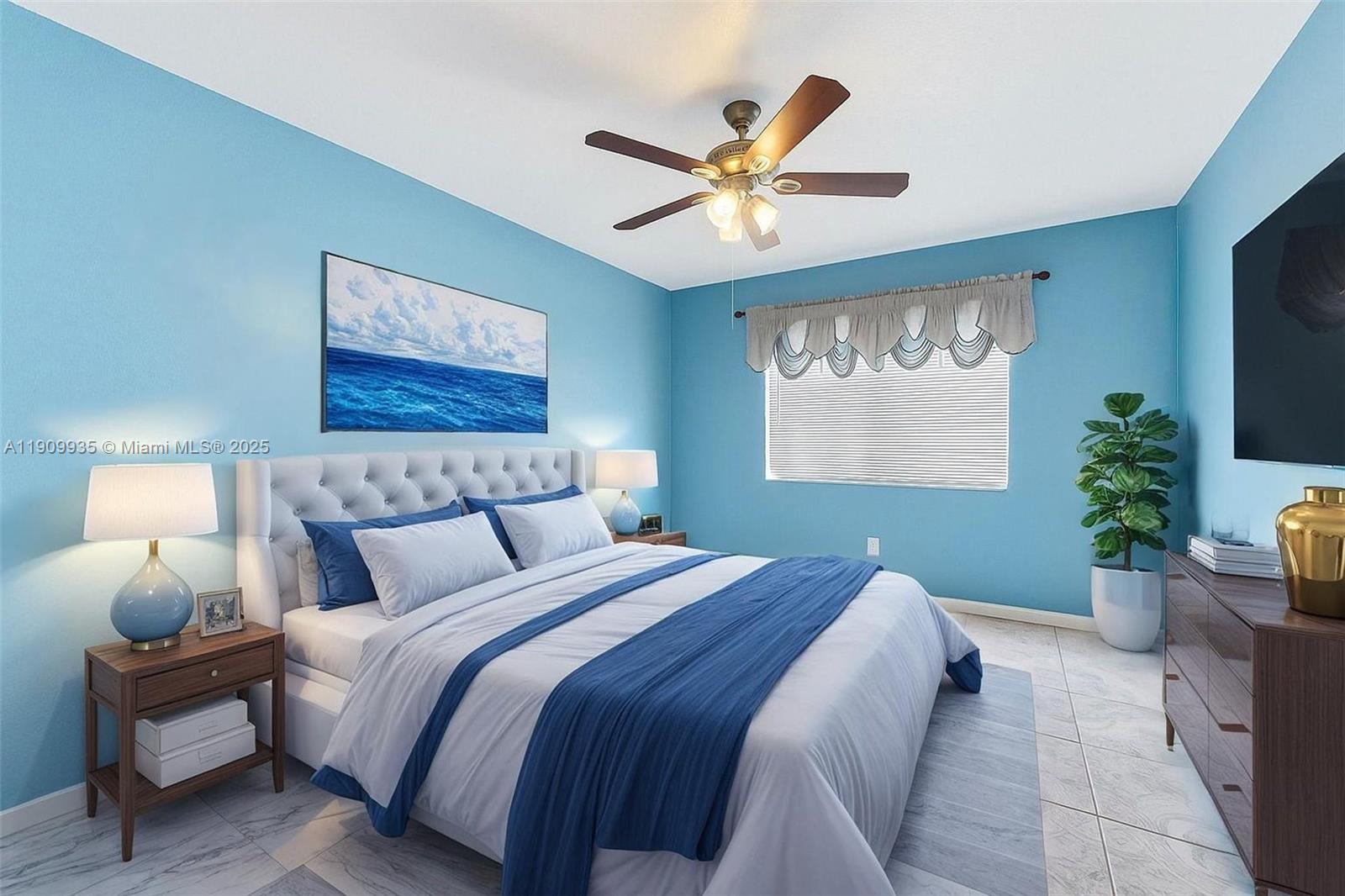 427 Northwest 84th Terrace, Unit 427 Miami, FL 33150 - Photo 31 of 40 a bed room with a bed window and a flat screen tv