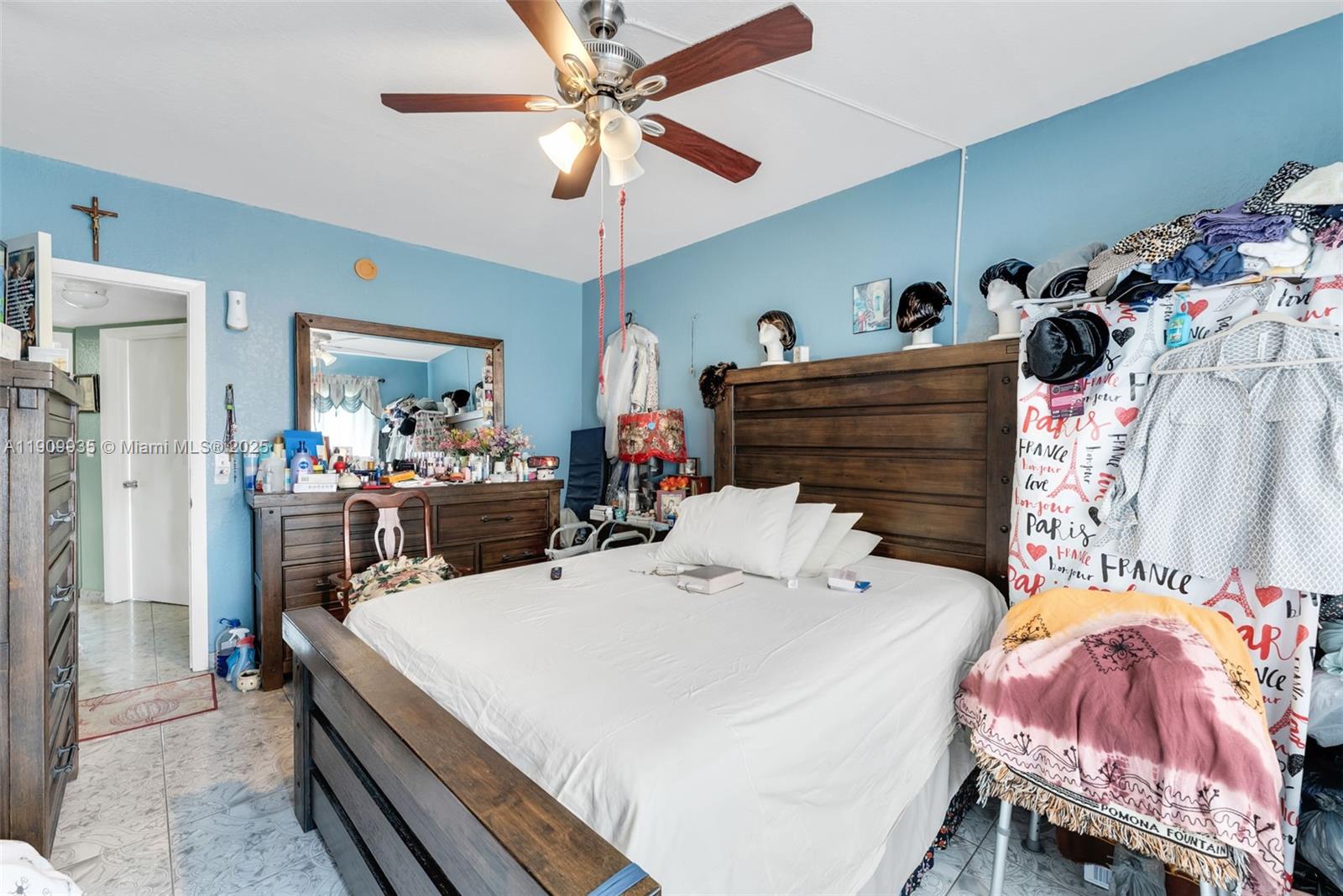 427 Northwest 84th Terrace, Unit 427 Miami, FL 33150 - Photo 33 of 40 a bed room with a bed and a tv