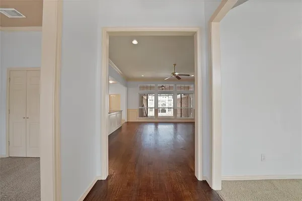 a view of an empty room and window