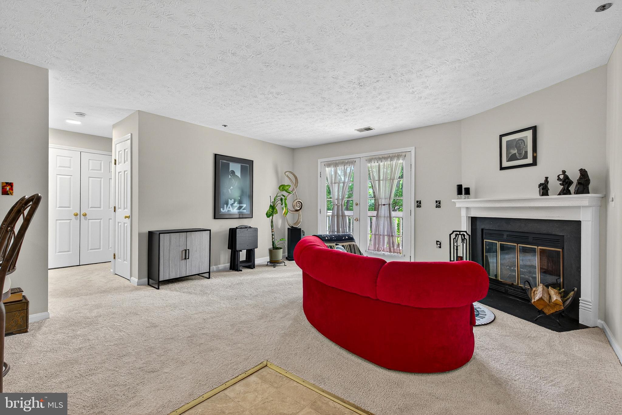 6415 Greenfield Road, Unit 1303 Elkridge, MD 21075 - Photo 3 of 25 Living Room with Wood Burning Fireplace